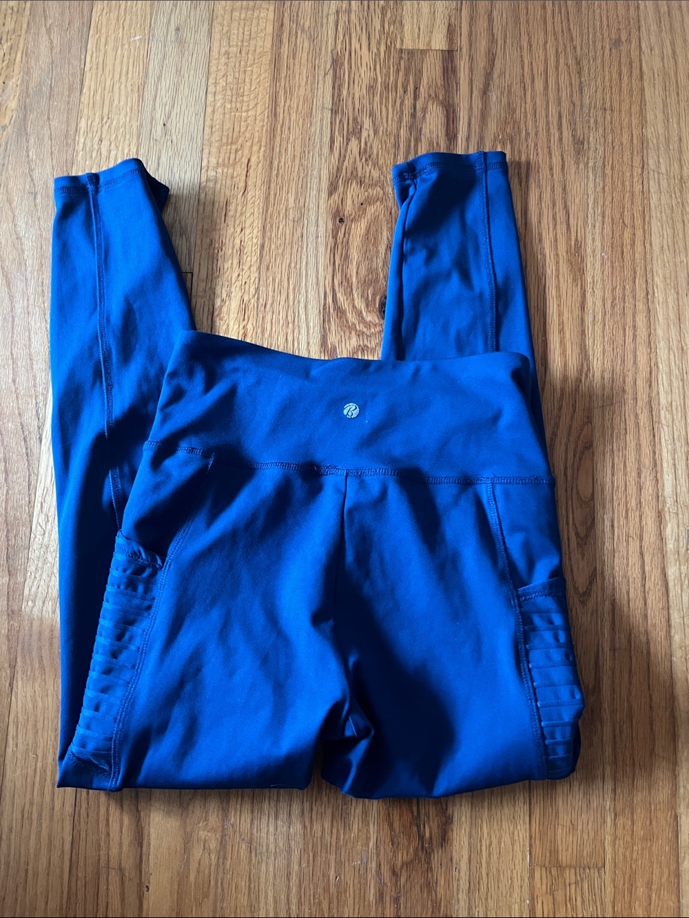 Bally Women’s Bright Blue Stretch leggings with side pockets. Size M